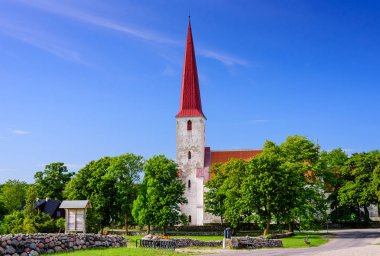 Sightseeing of Saaremaa island. Medieval Lutheran church of St. Michael in the village of Kihelkonna, Saaremaa island, Estonia clipart