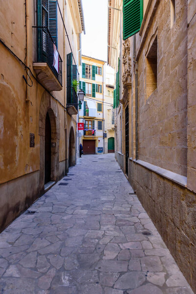 Mallorca island, Balearic Islands, Spain - January 3, 2019: colorful narrow street in Palma de Mallorca old town
