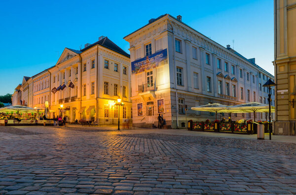 Tartu, Estonia - June 3, 2018: Sightseeing of Tartu. The Leaning house (Tartu Art museum), beautiful evening view