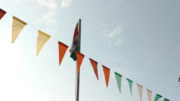 Indian flag hosted in blue sky, decoration on Independence day in Indian village school of zpps