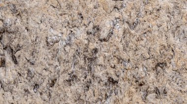 kırmızı kumtaşı bloğu siyah mürekkebi desenler gibi gösteriyor