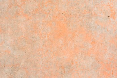 Çizik ve çatlaklarla dolu bir duvar parçası.