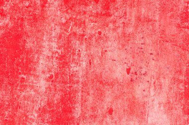 Çizik ve çatlaklarla dolu bir duvar parçası.