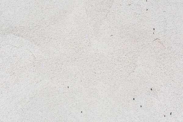 Фрагмент стены с царапинами и трещинами