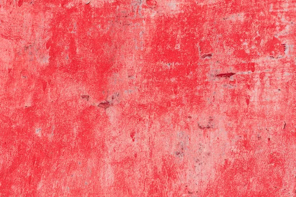 Çizik ve çatlaklarla dolu bir duvar parçası.