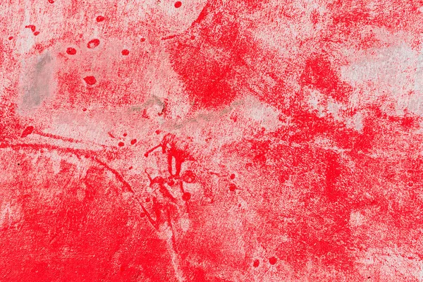 Çizik ve çatlaklarla dolu bir duvar parçası.