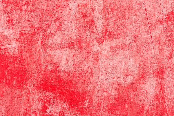 Çizik ve çatlaklarla dolu bir duvar parçası.