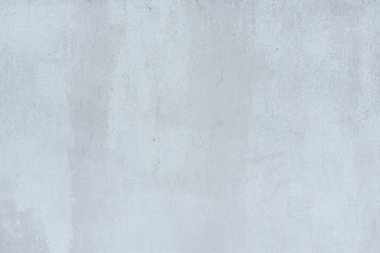 Çizik ve çatlaklarla dolu bir duvar parçası.