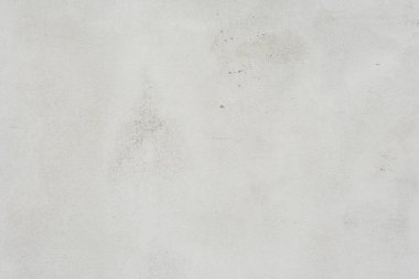 Çizik ve çatlaklarla dolu bir duvar parçası.