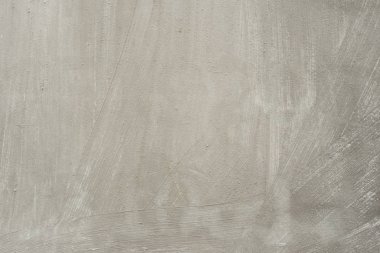 Çizik ve çatlaklarla dolu bir duvar parçası.