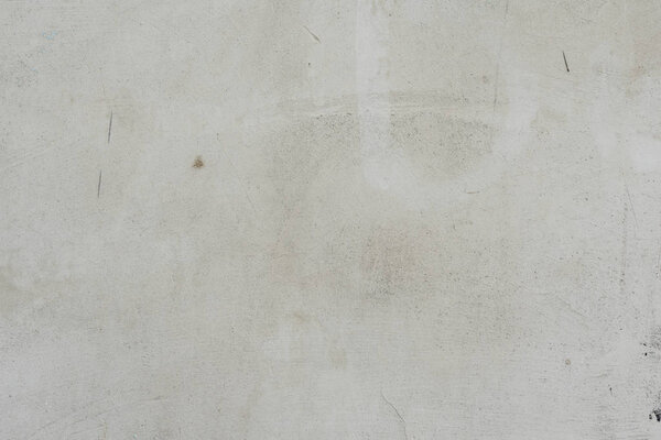 Фрагмент стены с царапинами и трещинами