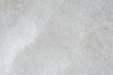 Çizik ve çatlaklarla dolu bir duvar parçası.