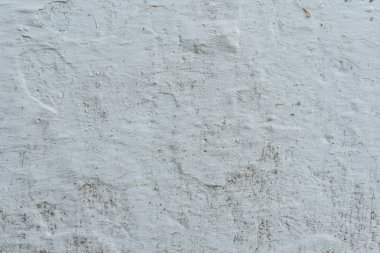 Çizikler ve çatlaklar ile duvar parçası. Arka plan olarak kullanılabilir