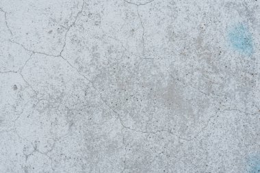 Çizikler ve çatlaklar ile duvar parçası. Arka plan olarak kullanılabilir