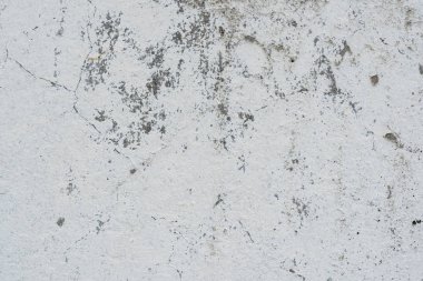 Çizikler ve çatlaklar ile duvar parçası. Arka plan olarak kullanılabilir