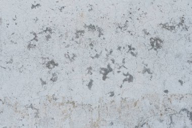 Çizikler ve çatlaklar ile duvar parçası. Arka plan olarak kullanılabilir