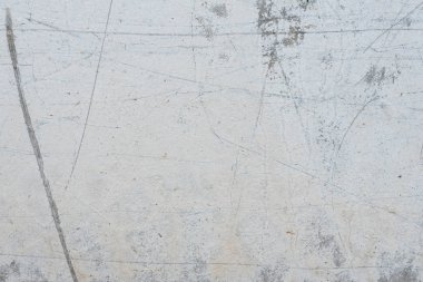 Çizikler ve çatlaklar ile duvar parçası. Arka plan olarak kullanılabilir