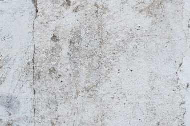 Çizikler ve çatlaklar ile duvar parçası. Arka plan olarak kullanılabilir