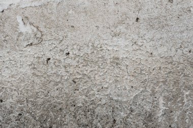 Çizikler ve çatlaklar ile duvar parçası. Arka plan olarak kullanılabilir