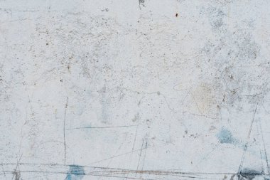 Çizikler ve çatlaklar ile duvar parçası. Arka plan olarak kullanılabilir