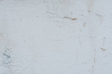 Çizikler ve çatlaklar ile duvar parçası. Arka plan olarak kullanılabilir