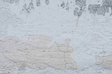 Çizikler ve çatlaklar ile duvar parçası. Arka plan olarak kullanılabilir