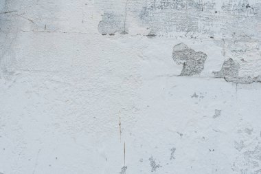 Çizikler ve çatlaklar ile duvar parçası. Arka plan olarak kullanılabilir