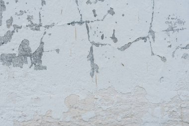 Çizikler ve çatlaklar ile duvar parçası. Arka plan olarak kullanılabilir