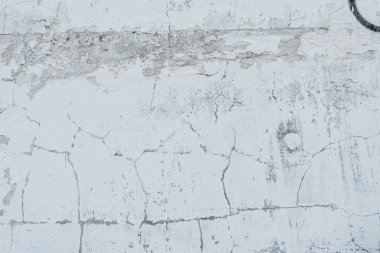Çizikler ve çatlaklar ile duvar parçası. Arka plan olarak kullanılabilir