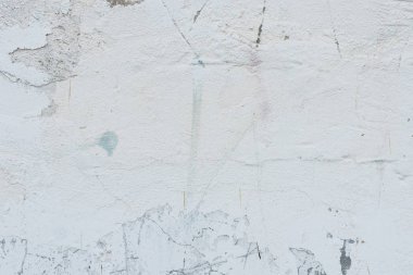 Çizikler ve çatlaklar ile duvar parçası. Arka plan olarak kullanılabilir