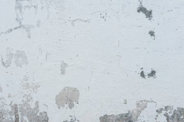 Çizikler ve çatlaklar ile duvar parçası. Arka plan olarak kullanılabilir