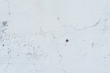 Çizikler ve çatlaklar ile duvar parçası. Arka plan olarak kullanılabilir