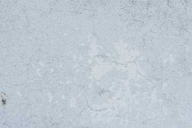 Çizikler ve çatlaklar ile duvar parçası. Arka plan olarak kullanılabilir