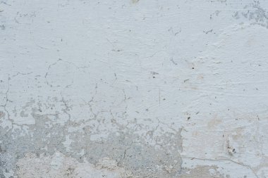 Çizikler ve çatlaklar ile duvar parçası. Arka plan olarak kullanılabilir