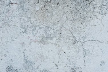 Çizikler ve çatlaklar ile duvar parçası. Arka plan olarak kullanılabilir