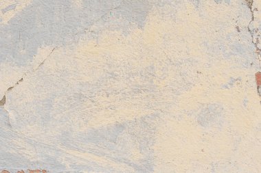 Çizikler ve çatlaklar ile duvar parçası. Arka plan olarak kullanılabilir