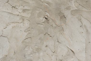 Çizikler ve çatlaklar ile duvar parçası. Arka plan olarak kullanılabilir