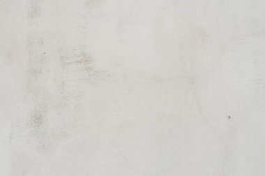 Çizikler ve çatlaklar ile duvar parçası. Arka plan olarak kullanılabilir