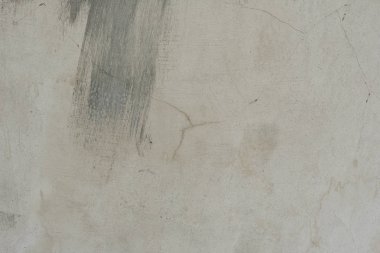 Çizikler ve çatlaklar ile duvar parçası. Arka plan olarak kullanılabilir