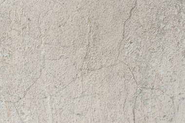 Çizikler ve çatlaklar ile duvar parçası. Arka plan olarak kullanılabilir