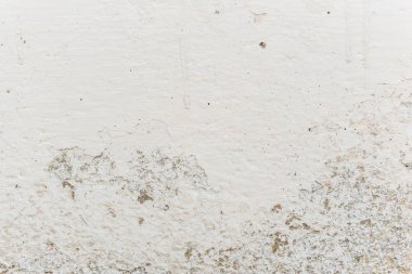 Çizikler ve çatlaklar ile duvar parçası. Arka plan olarak kullanılabilir