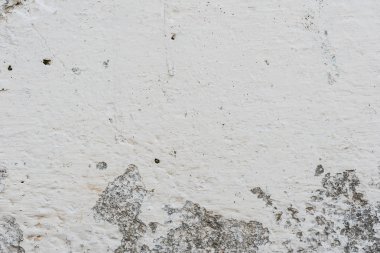Çizikler ve çatlaklar ile duvar parçası. Arka plan olarak kullanılabilir