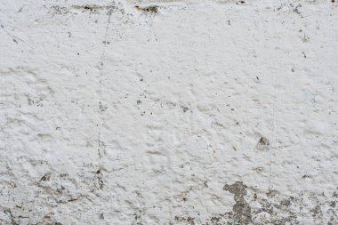 Çizikler ve çatlaklar ile duvar parçası. Arka plan olarak kullanılabilir