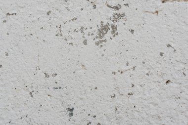 Çizikler ve çatlaklar ile duvar parçası. Arka plan olarak kullanılabilir