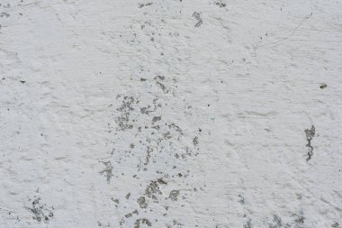 Çizikler ve çatlaklar ile duvar parçası. Arka plan olarak kullanılabilir