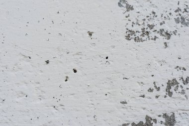 Çizikler ve çatlaklar ile duvar parçası. Arka plan olarak kullanılabilir