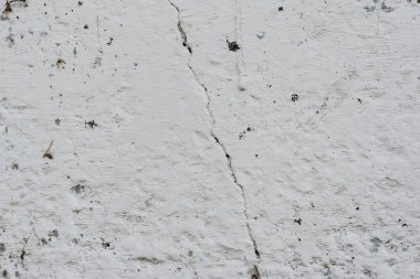 Çizikler ve çatlaklar ile duvar parçası. Arka plan olarak kullanılabilir