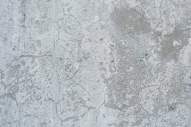 Çizikler ve çatlaklar ile duvar parçası. Arka plan olarak kullanılabilir