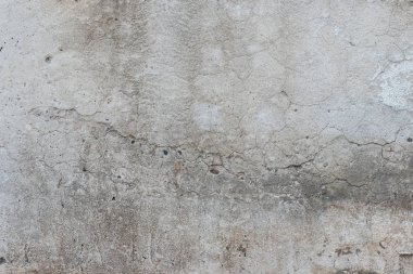 Çizikler ve çatlaklar ile duvar parçası. Arka plan olarak kullanılabilir