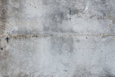 Çizikler ve çatlaklar ile duvar parçası. Arka plan olarak kullanılabilir